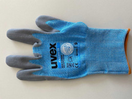 Blauer uvex phynomic C5 Schutzhandschuh als Versehrtenhandschuh mit gekürztem Mittelfinger